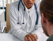 Doctor and male patient — health screening