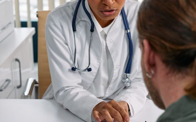 Doctor and male patient — health screening