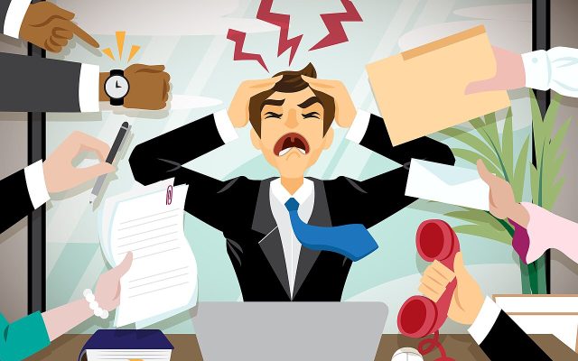 stressed man office work