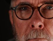 Thoughtful middle-aged man looking to the side