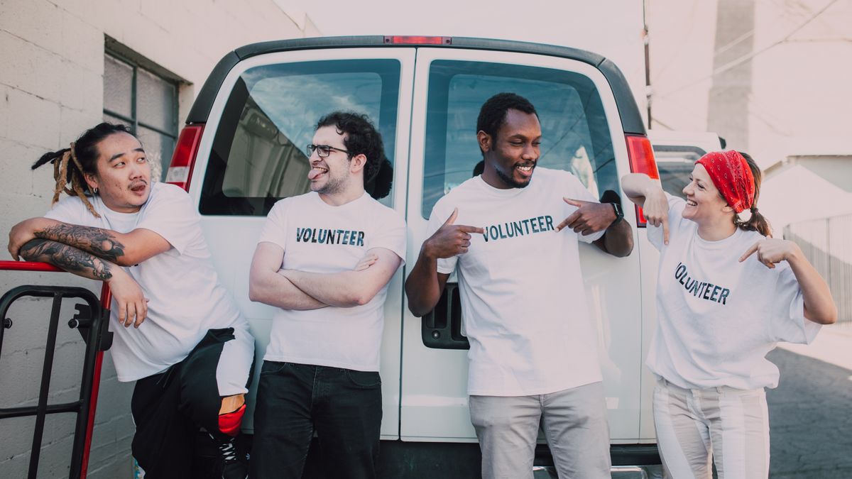 A group of volunteers together, connecting through community activity