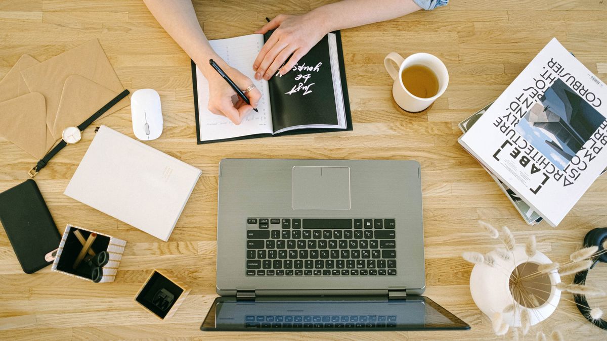 Woman journaling to notice negative self-talk and build self-esteem