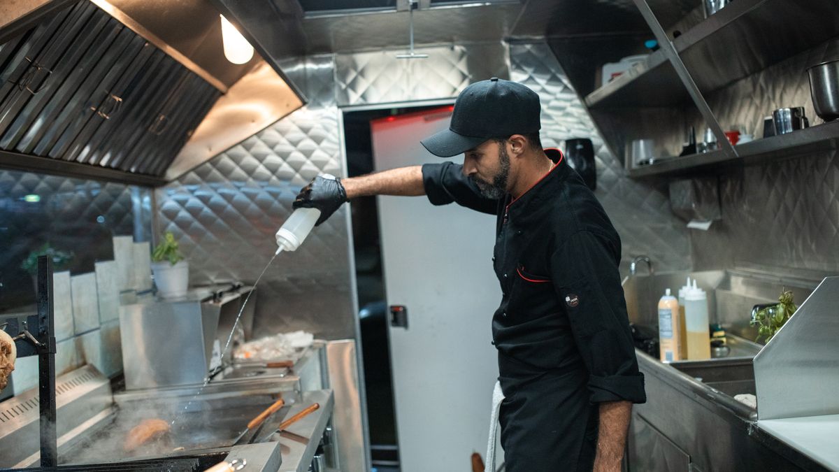 Man preparing a healthy protein-rich meal after 50