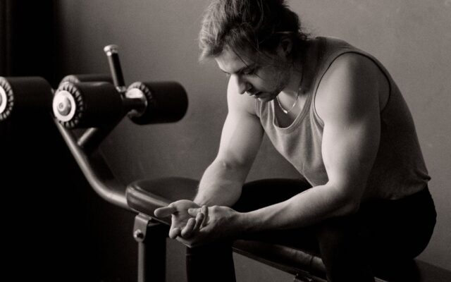 Man resting and recovering after a workout on a rest day