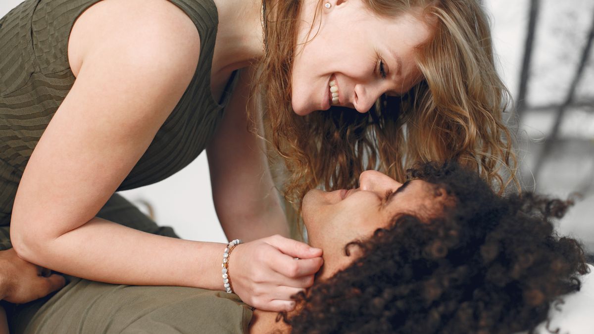 Affectionate couple facing each other showing intimacy beyond sexual frequency