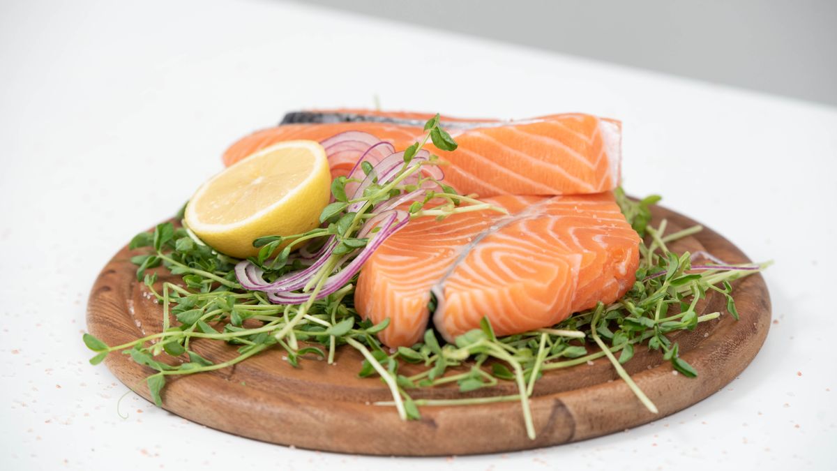 Salmon served with lemon on a plate as an omega-3 rich balanced meal