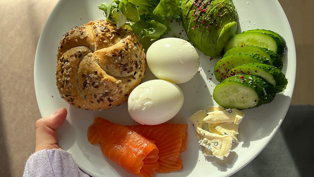 Plate of salmon, eggs and avocado, foods rich in vitamin B12