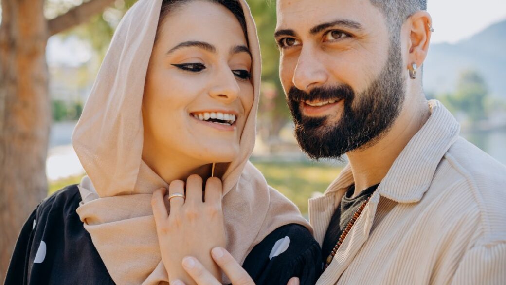 Happy adult couple together at home, reflecting on how medications can affect libido