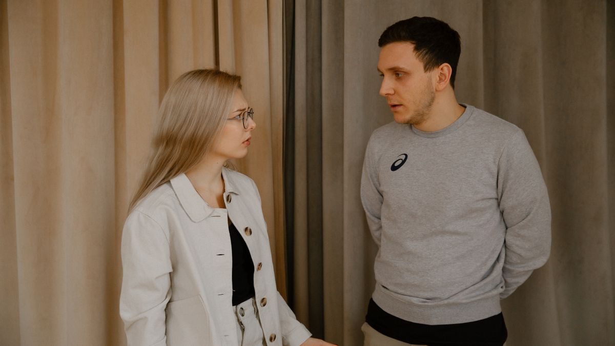 Adult couple having a serious conversation about sexual health and testing