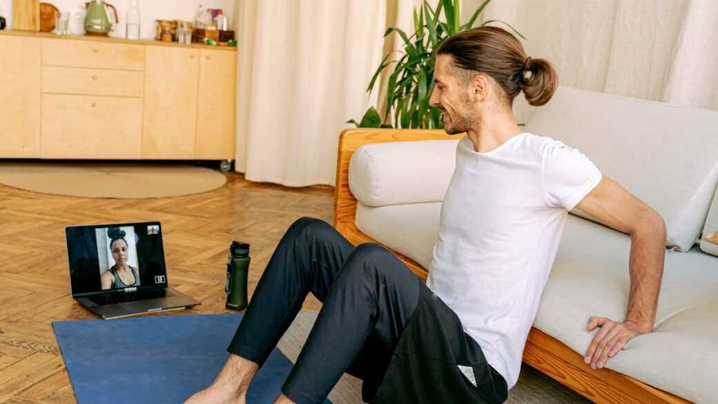 Man doing a short home workout in his living room